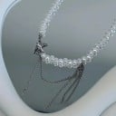 Gyöngyös nyaklánc gyöngyház színekben és természetes megjelenéssel, rétegzett láncokkal és madár medállal, finom elegáns ékszer 2