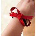 Hair Tie with a Large Red Bow Shiny Acrylic Bow 8.8 cm on an Elastic Black Hair Tie For Ponytails and as a Wrist Decoration 1