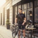 Herren Fahrradset Trikot mit kurzen Ärmeln und Shorts mit Polster 90 % Polyester und 10 % Lycra Schwarzes Trikot mit gelben Details 7