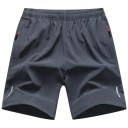 Herrsportshorts med elastisk midja Andningsbara träningsshorts med blixtlåsfickor Reflekterande element Bekväma löparshorts 5