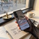 Holdbart magnetisk etui til Samsung Galaxy A55 Orange tog på skinner over vandet Trådløs opladning Sort ramme og orange knapper 4