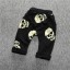 Jungen-Jogginghose mit Totenkopf-Print – Schwarz 1