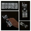 Kabelloser Controller mit Mini-Tastatur 2,4 GHz Air Mouse mit Gyroskopen IR-Lernen Kunststoff-Fernbedienung für 2x AAA-Batterien 17x5x2 cm 4