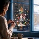Karácsonyi ablakmatricák Többször használható Karácsonyfák díszekkel Mikulással és havas falucska Felirat Merry Christmas Karácsonyra 3