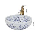 Keramické umyvadlo se zlatým kohoutkem s ozdobnými kameny bílé s modrým květovaným zdobením 400 x 140 mm v čínském retro stylu na desku 4