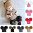 Kinderwintermuts met pompons J3028 1
