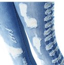 Kvinders rippede jeans 8