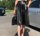 Ladies' Below-Knee Skirt Made of Faux Leather and Polyester Flared Flowing Cut with Pleats at the Waist Wide Waistband Black Colour Glossy Surface 2