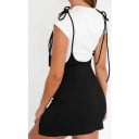 Ladies' black mini skirt with shoulder straps and a high waist Short solid-colour skirt made from polyester for a t-shirt or blouse 4