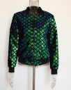 Ladies' bomber jacket with teal sequins Diamond pattern on a black background Black ribbed collar and trims Zip and pockets Cotton 6