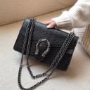 Ladies' crossbody bag with a snake pattern and decorative clasp Dark metal chain strap Flap Synthetic leather 25 x 16 x 9 cm 2