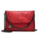 Ladies' crossbody bag with chain strap Flap edged with chain Round metal pendant PU leather and polyester Dimensions 29 x 19 x 7 cm 2