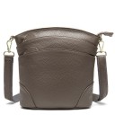 Ladies' crossbody bag with shoulder strap Main compartment and front zip pocket Adjustable strap with carabiners Grainy surface 19.5 x 21 x 3