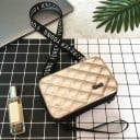 Ladies' crossbody handbag with a hard plastic shell Diamond pattern Zip around the edge Long strap and hand loop 17.5 x 10.5 x 7 cm 7