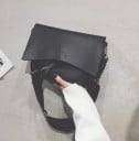 Ladies' crossbody handbag with a large flap and decorative strap Rounded shape Gold hardware PU leather 29 x 22 x 7 cm For everyday use 1