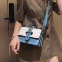 Ladies' crossbody handbag with flap and metal buckle Decorative stitching Short handle and long strap PU leather and polyester 20 x 14 x 7