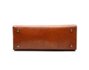 Ladies' handbag for hand and shoulder Spacious bag made of synthetic leather with a glossy surface Two handles and adjustable strap 33 x 28 x 9