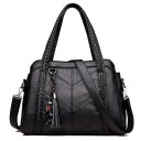 Ladies' handbag for hand or shoulder carry made of PU leather Two handles with woven decoration Detachable strap Tassel pendant Dimensions 2