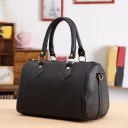 Ladies' Handbag in a Cylindrical Shape Artificial Leather with a Fine Grain Surface Two Handles and a Shoulder Strap Zip at the Top Gold 1