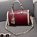 Ladies' handbag in the shape of a cylinder with a snake pattern Handles and trims with a snake skin print Decorative pendant Shoulder strap 3