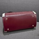 Ladies' handbag in the shape of a cylinder with a snake pattern Handles and trims with a snake skin print Decorative pendant Shoulder strap 5