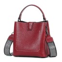 Ladies' handbag with top handle and wide patterned shoulder strap Metal feet Decorative stitching 20 x 20.5 x 12 cm 12