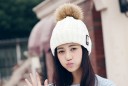 Ladies' Insulated Knitted Hat with a Large Fluffy Pom-Pom Inner Lining Chunky Ribbed Knitting Turned-up Cuff with a Patch 18
