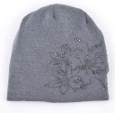 Ladies' knitted cap with floral gemstone motif Loose extended fit Double-layered with gathered back Cotton and acrylic 5