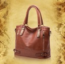 Ladies' leather handbag for hand or shoulder carry Detachable adjustable strap Gold metal buckles Rear zip pocket 34 x 26 x 16 cm 4