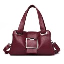 Ladies' leather handbag for hand or shoulder use Decorative square buckle Two handles and strap Leather and polyester Dimensions 32 x 18 5