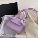 Ladies' mini crossbody handbag with decorative knots on the handle Flap and long strap over the shoulder Crocodile pattern PU leather 17 10
