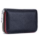 Ladies' mini zip-around wallet in genuine leather Textured surface and striped trim Metal zip with leather pull Dimensions 10.5 x 7 x 2.5 cm 1