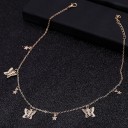Ladies' necklace with pendants in the shape of butterflies and stars Delicate chain with an extension end Costume jewellery metal Length 36 cm 2