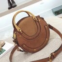 Ladies' round crossbody handbag with a sturdy metal handle Strap with carabiners Decorative stitching and studs PU leather 17 x 16 x 8 cm 4