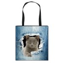 Ladies' shopper bag with a realistic print of an animal peeking out from torn denim Canvas and polyester Black handles Square shape 5