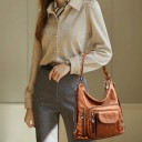 Ladies' Shoulder Bag Made of Artificial Leather Woven Handle Front Pocket with Flap Vertical Zip Pockets Decorative Pendants Dimensions 32 x 9