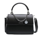 Ladies' small handbag for hand or shoulder carry with flap and top handle Decorative silver chain with round pendant PU leather 21 x 16 x 2