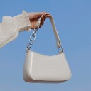 Ladies' small shoulder bag made of artificial leather 21 x 12.5 x 8 cm Baguette shape Handle with decorative silver chain Smooth glossy 1
