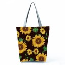Ladies' Sunflower Print Bag Polyester bag with grey handles and an upwardly widened shape Floral pattern Dimensions 27 x 37 x 8 cm 1