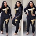 Ladies' sweatshirt and sweatpants set with shiny gold embellishment Black set with long sleeves and round neckline Polyester and cotton 5