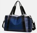 Ladies' travel bag with a checkered pattern for weekends and holidays Two handles and a detachable shoulder strap Nylon Dimensions 32 x 21 x 52 cm 2