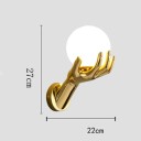 Lampa na stenu v tvare ruky držiacej sklenenú guľu 27 x 22 cm Pryskyřica a sklo Tri odtiene svetla Zlatá Patica G9 5 W Dekorácia do izby 3