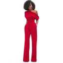 Lang damejumpsuit med asymmetriske ærmer 5