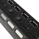 Laturi 7 USB-porttia kytkimillä 6
