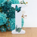 Letra decorativa de madera con mariposas 9