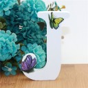 Letra decorativa de madera con mariposas 10