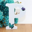 Letra decorativa de madera con mariposas 16