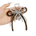 Llave de perlas de resina imitación de perlas con lazo de leopardo accesorio elegante para llaves bolso mochila complemento de moda 1