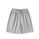 Losse sportshorts voor heren met trekkoord, lichtgewicht en ademend materiaal. Fitness hardloopshorts voor training, oefening en vrije tijd. 1