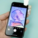 Lupa con aumento de 60x Luz LED y UV Microscopio portátil con clip para teléfono Autenticación de billetes Observación detallada 5